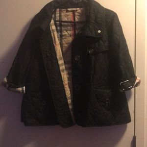 Woman’s Burberry London coat